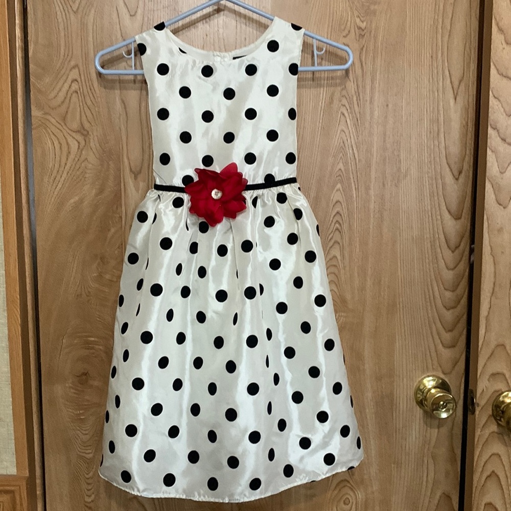 Adorable, black and white polkadot, girls George dress size 10 with red flower🌺